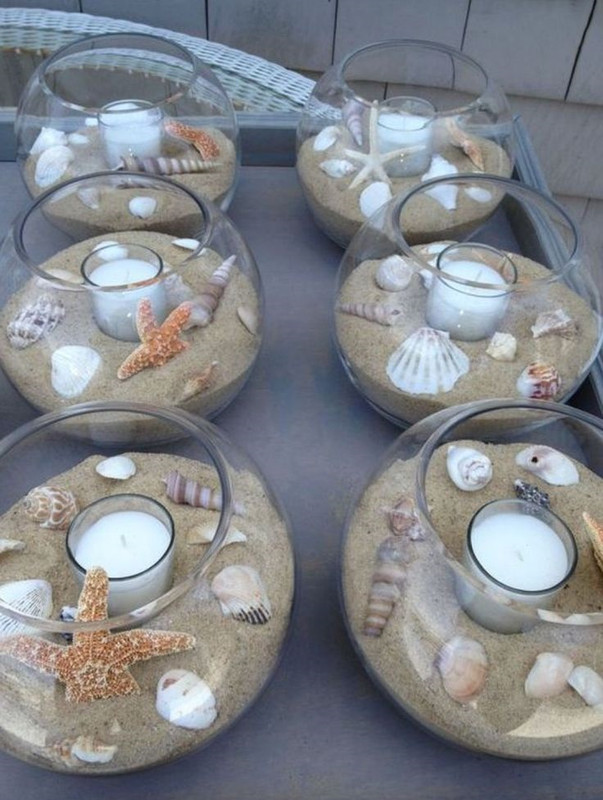 For a beach themed event, try adding sand, seashells, and other nautical elements to your bubble bowls